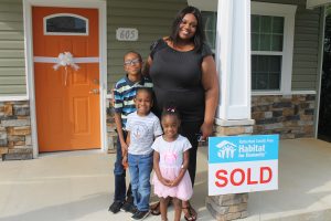 FamilyWithSoldSign